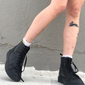 Dr. Martens black tag ankle boot.